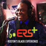 Tony Wilson "The Young James Brown" and crew perform in Studio 889 in glittery outfits. The logo for ERS+ Boston's Black Experience is overlayed onto the photo.