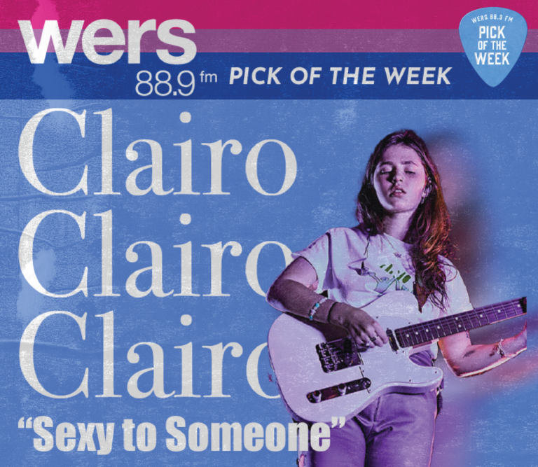 A photograph of Claire Cottrill, better known as Clairo, strumming a white electric guitar. The top third of the background has the three horizontal stripes of the bisexual pride flag (pink, purple, blue) with text that reads "WERS 88.9 Pick of the Week." The rest of the background is light blue and reads "Clairo" three times and "Sexy to Someone"