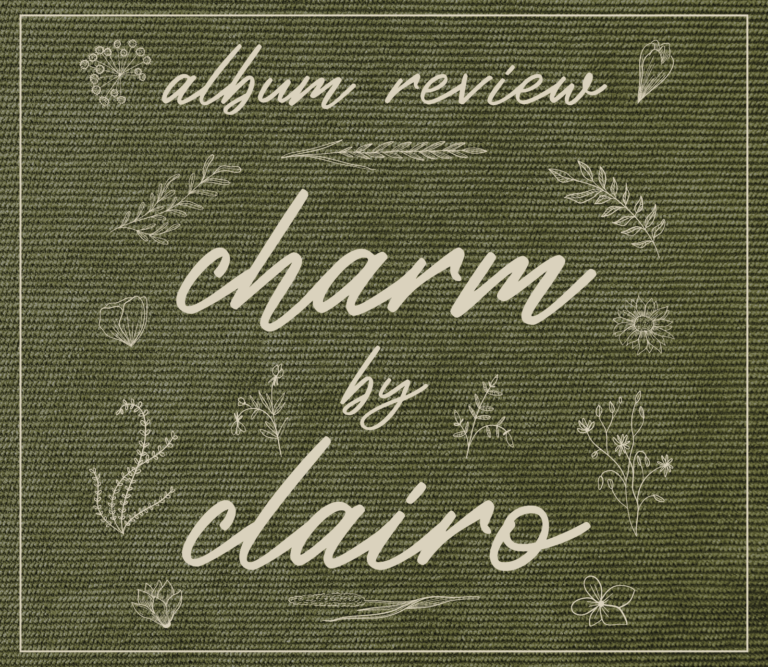 A collage illustration made to look like a forest green patch of fabric with white stitched embroidery of flowers and lettering, which reads: "Album Review, Charm by Clairo"