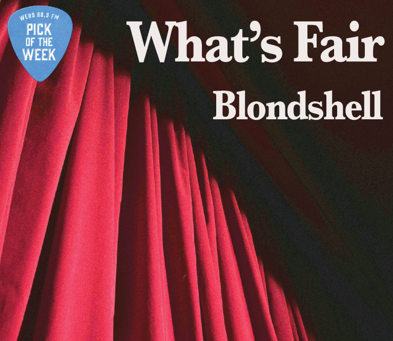 A red curtain has a shadow near the top, where light lettering reads "What's Fair" and "Blondshell."