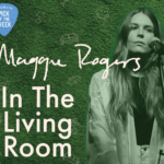 A green wallpaper with outlines of couches is set behind a green tinted photo of Maggie Rogers. Text reads "Maggie Rogers" and "In The Living Room."