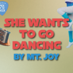 A gold and white background displays red and blue text that reads, "She Wants to go dancing" and "By Mt. Joy." To the left and right of the text is someone in a blue and white workout suit and a jukebox.