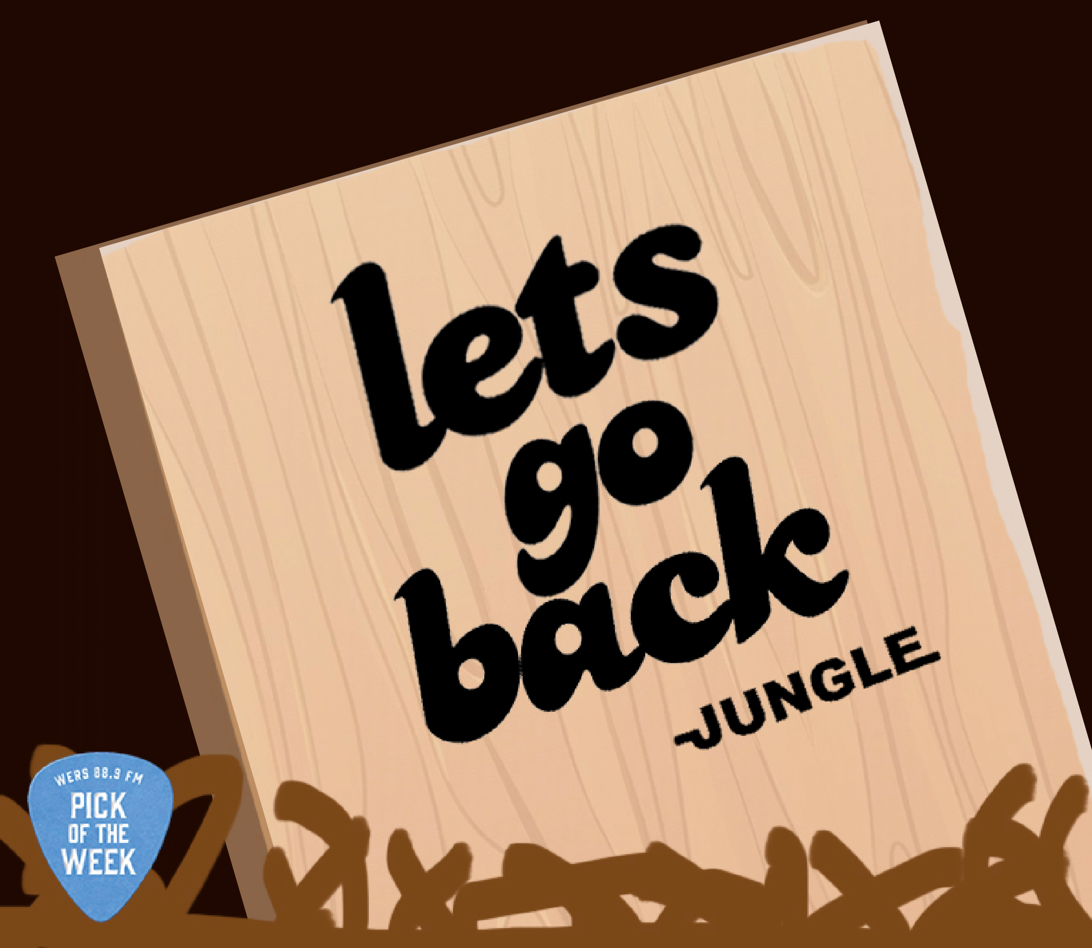 A wood panel has "Let's Go Back" and "Jungle" painted on it in black. The panel is behind short brown grass.