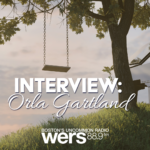 A swing hangs from a tree in a lush grass field. Text reads "Interview: Orla Gartland" over the image