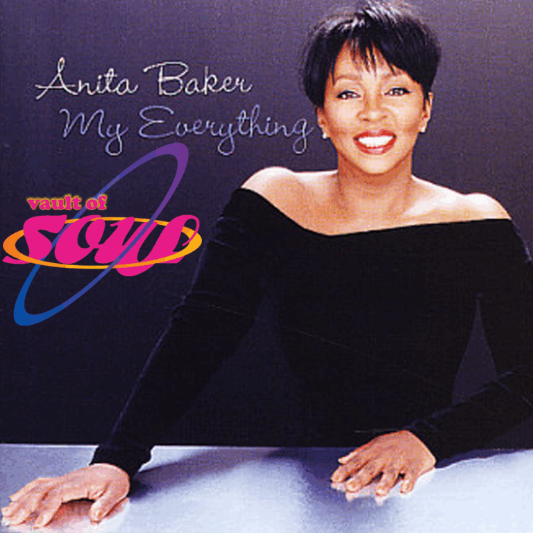 Image of Anita Baker wearing a black top looking forward. Anita Baker is spelled out in white next to her and Vault of Soul is written in purple, yellow, and pink underneath.