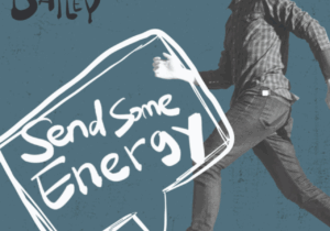 Will Dailey walking across a blue background for the cover of his recent single "Send Some Energy."